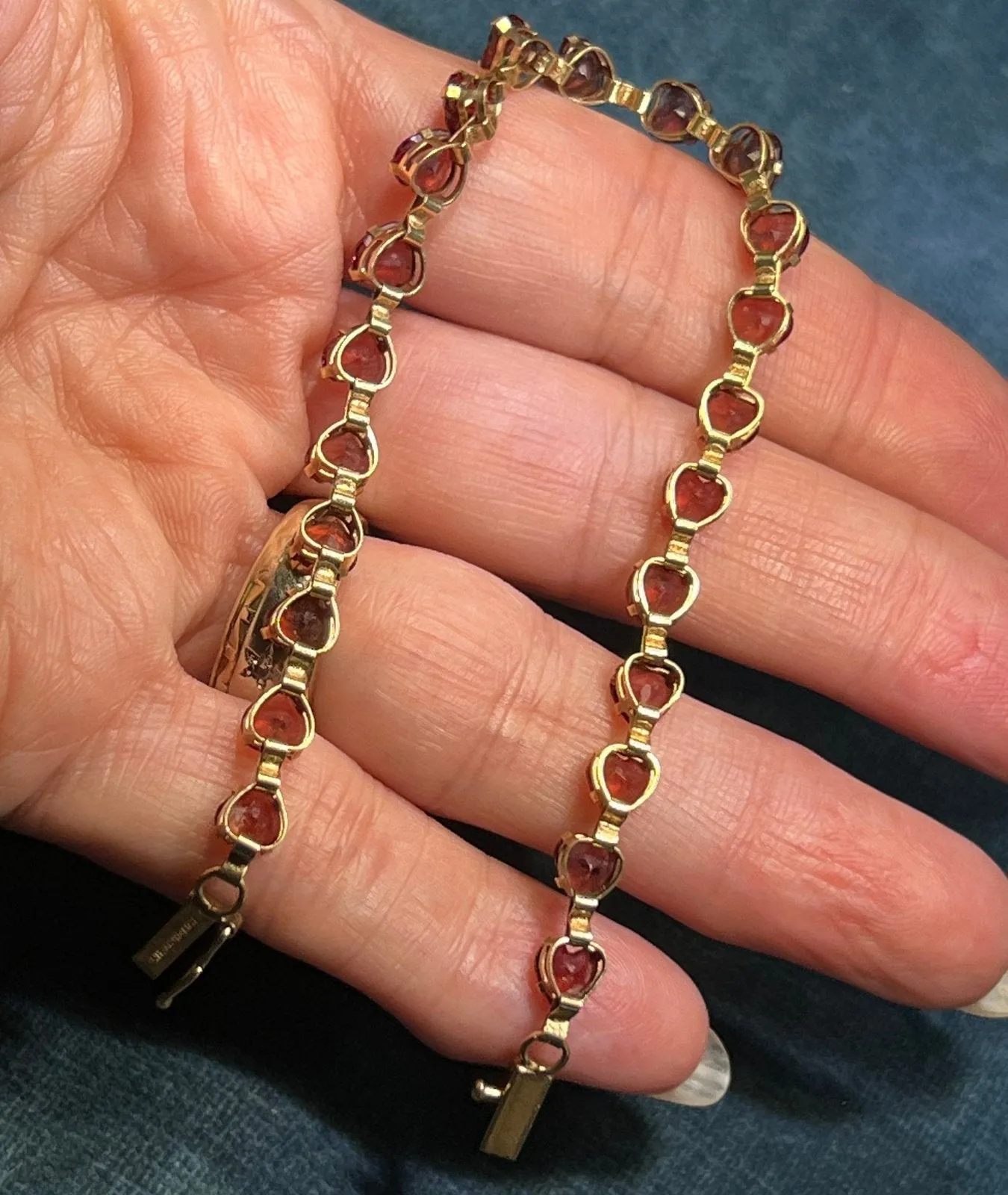 10k Yellow Gold Red Garnet Hearts Bracelet. Safety Clasp
