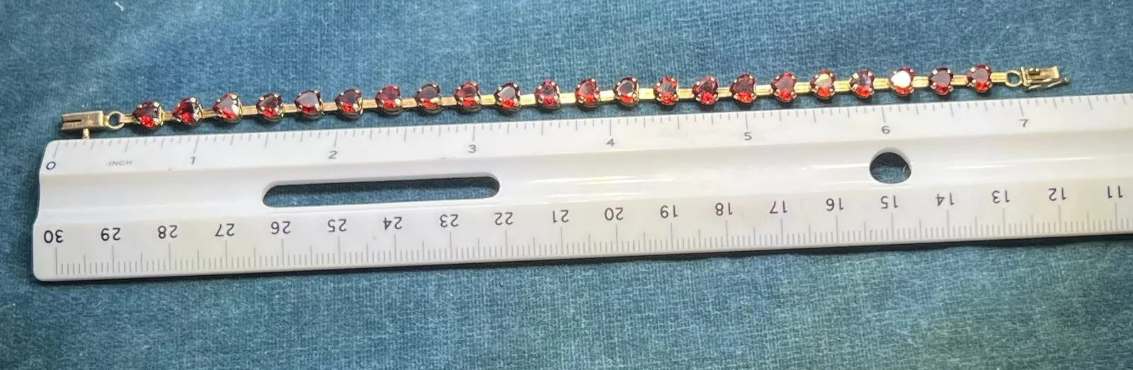 10k Yellow Gold Red Garnet Hearts Bracelet. Safety Clasp