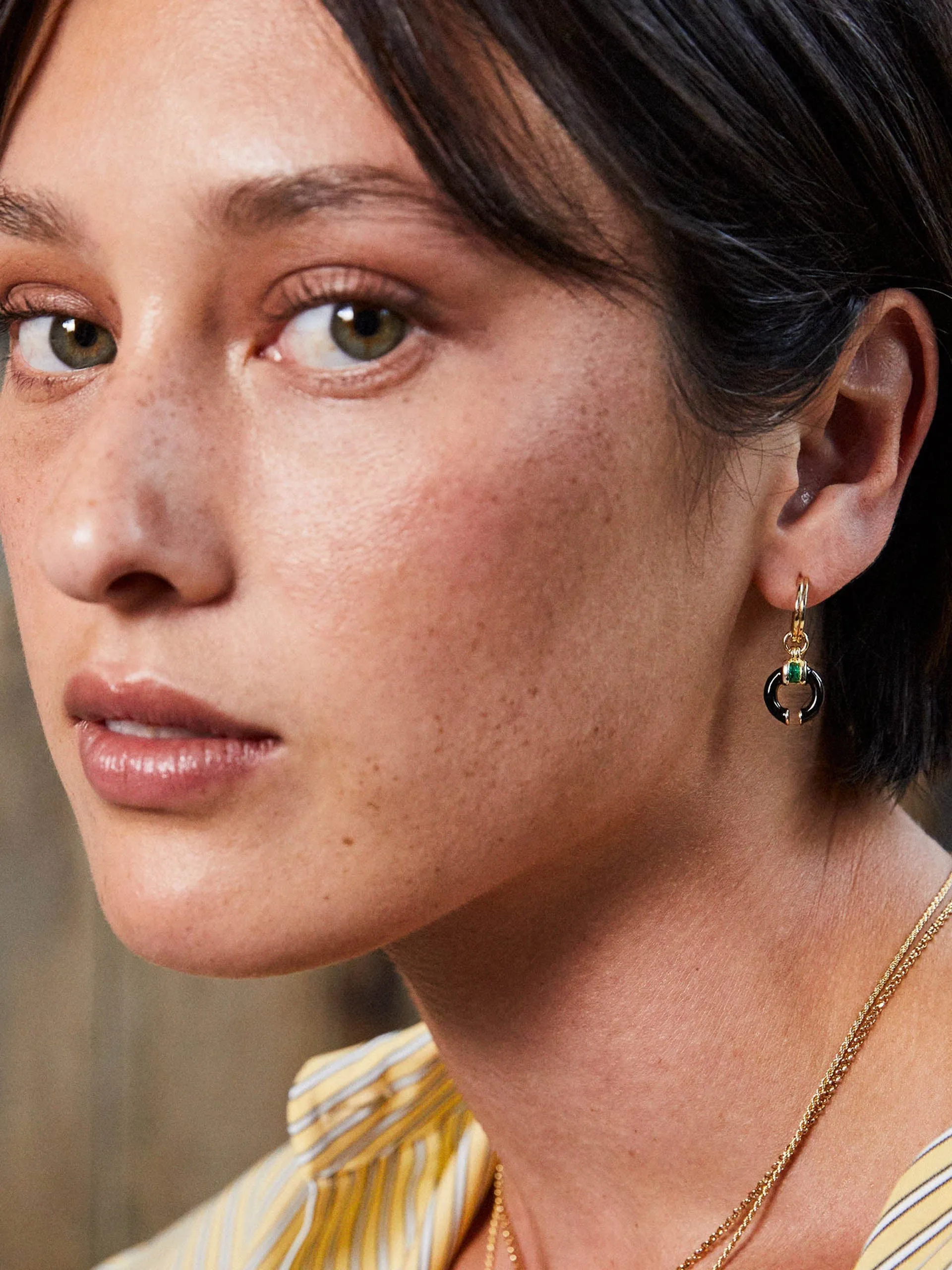 Black enamel Delphine earrings with emerald green stone