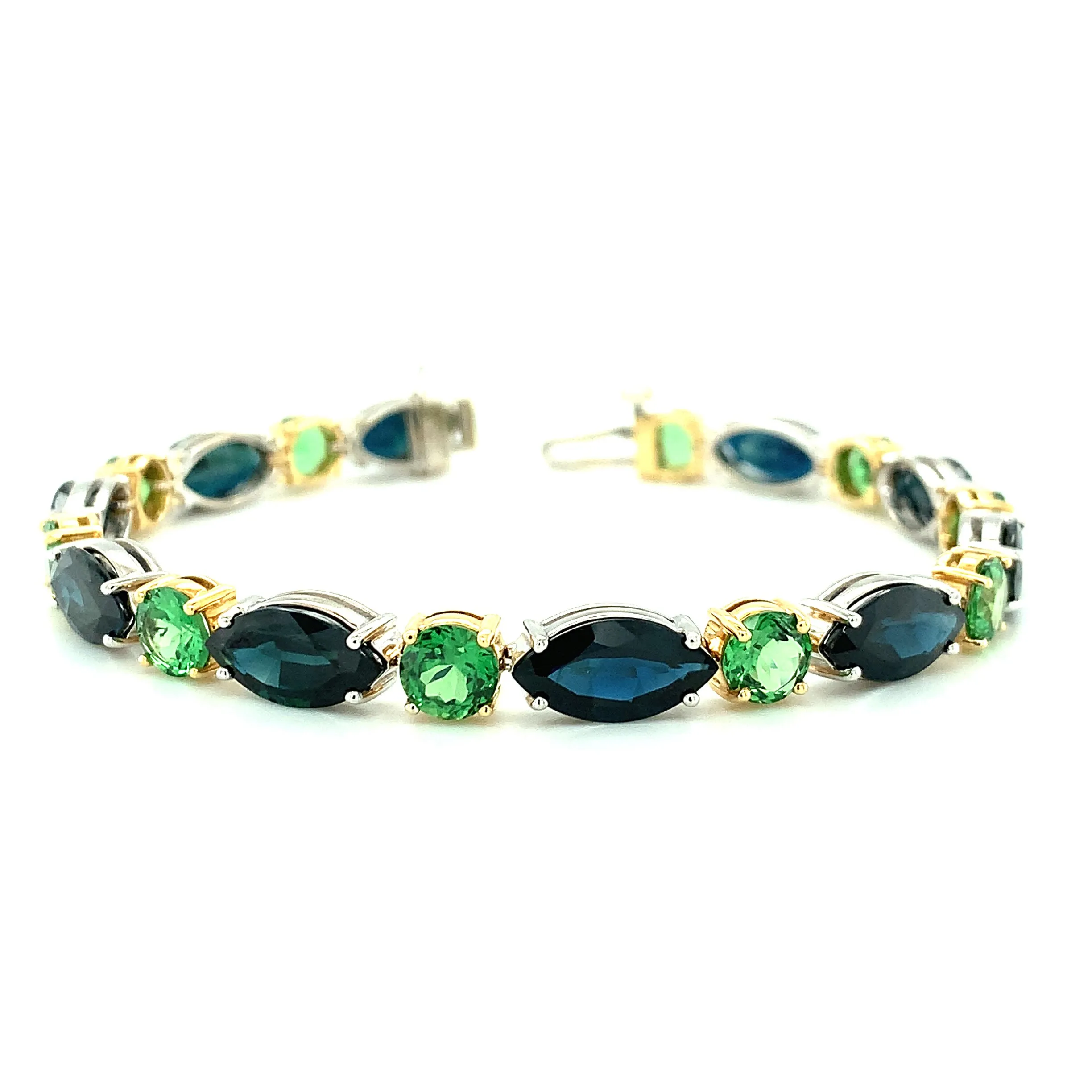 Blue Sapphire and Tsavorite Garnet Tennis Bracelet in White and Yellow Gold