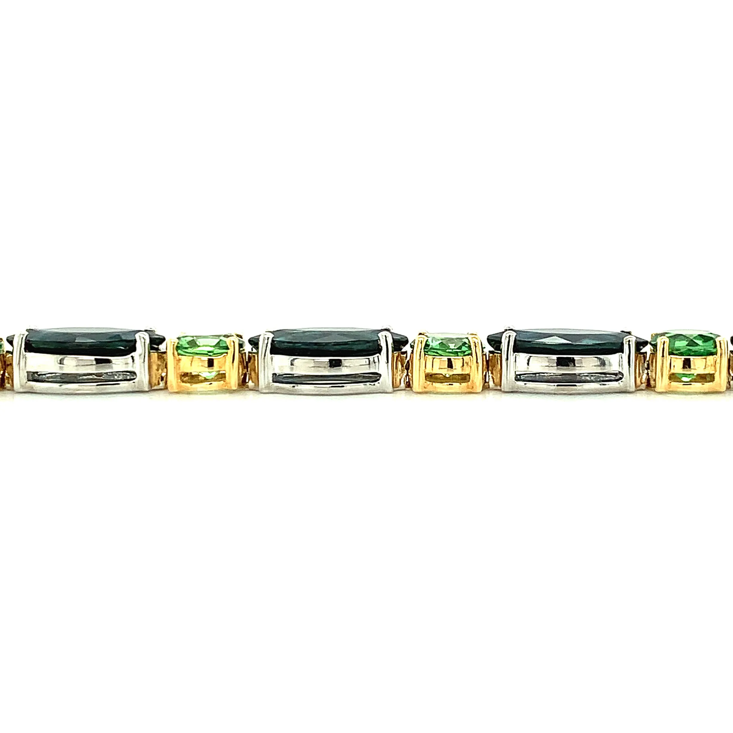 Blue Sapphire and Tsavorite Garnet Tennis Bracelet in White and Yellow Gold