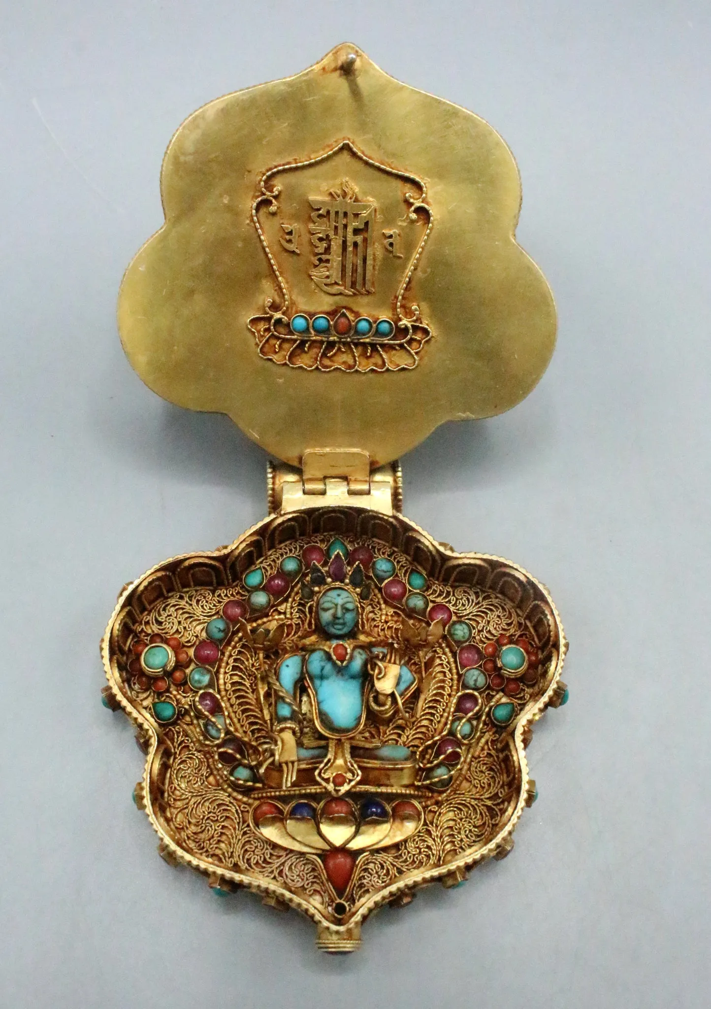 Masterpiece Hand Carved Gold Plated Chenrezig Ghau Pendant with Inlaid Turquoise and Ruby