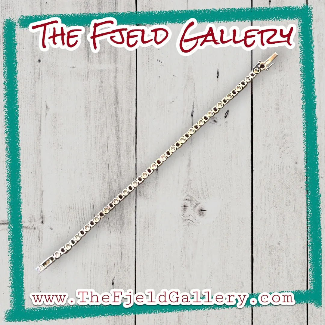 Sterling Silver Garnet Tennis Bracelet